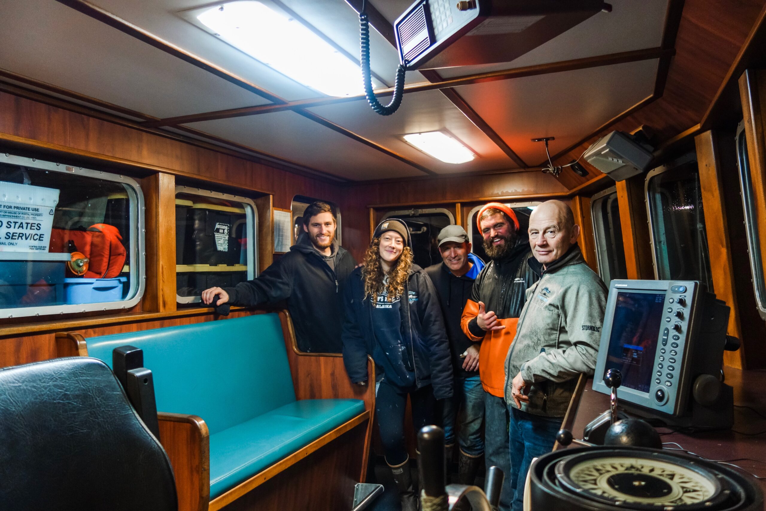 Bridge of the 91' Emerald Island. Right to left: Steve Daniels (Owner/Founder of Highliner Lodge), Jacob Leith (Fleet Manager), Rick Daniels (Head Carpenter), Abbie Gustafson (Operations Manager), and Dylan Grafe (General Manager)